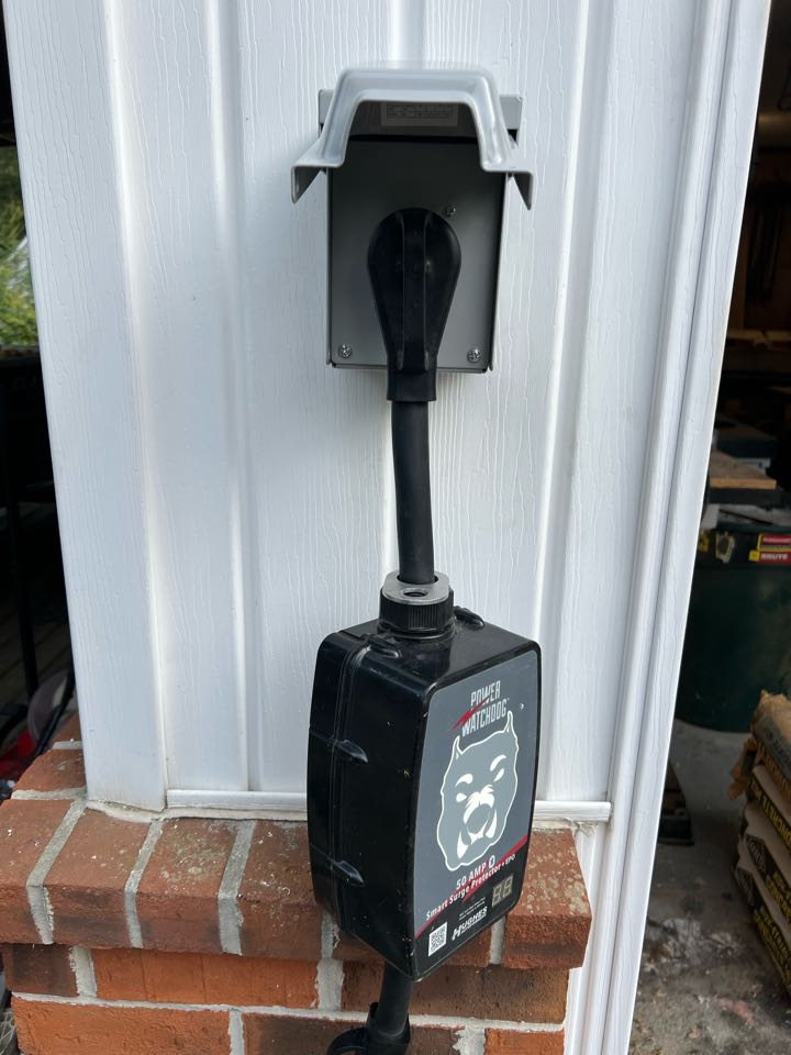 Institutions of 50A 240V RV plug and grounding system. The sub-panel was rewired to accommodate an additional grounding bar 