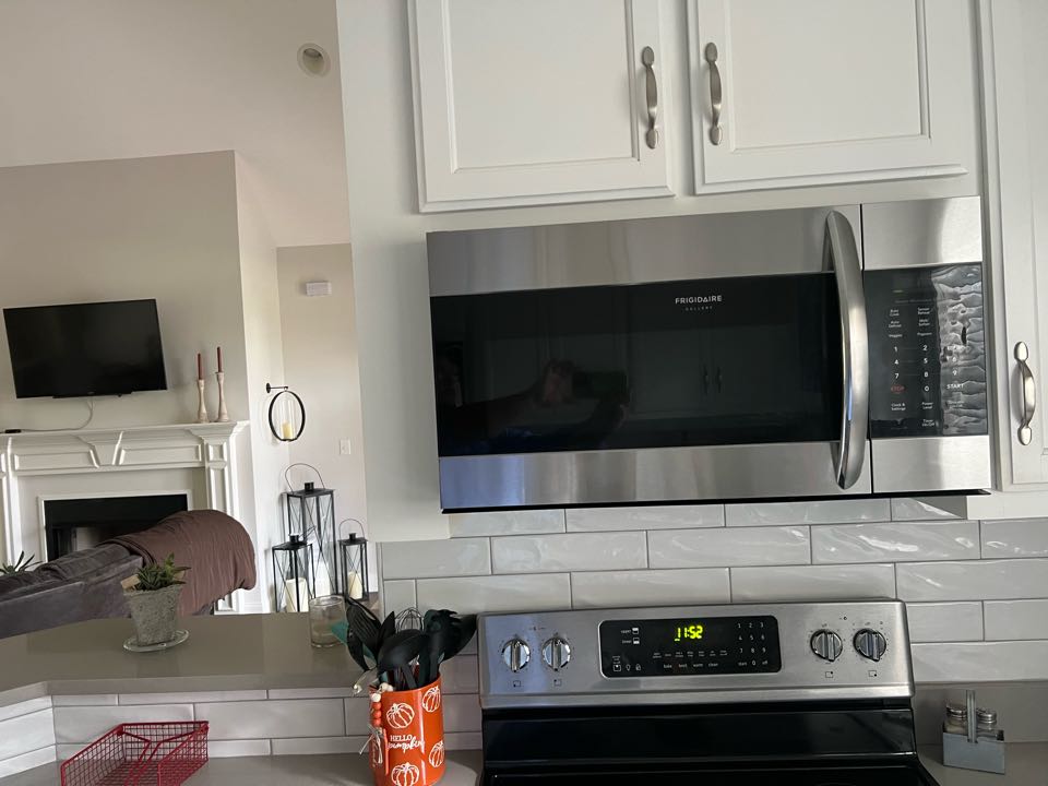 Troubleshooting issue with microwave tripping breaker found that microwave has an internal short circuit causing the breaker to trip recommended customer purchase a new microwave 