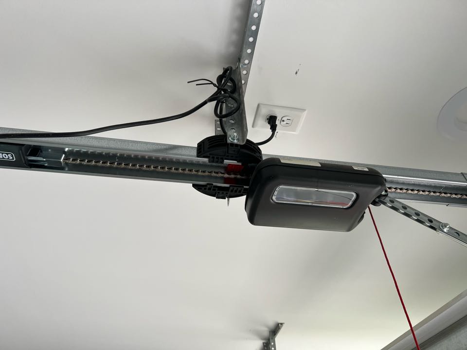 Outlet in garage and one outside not working checked gfci it checked out went through and found loose connection in garage door opener outlet fixed it and restored power back to outlets