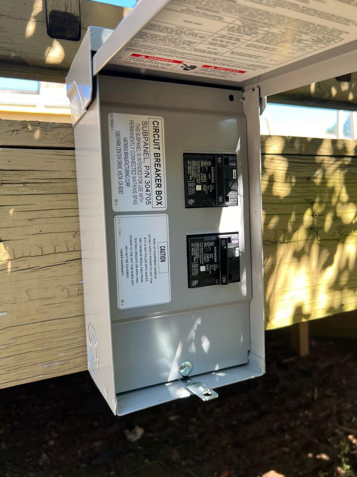 Wired in  20/30 split panel for a hot springs spa