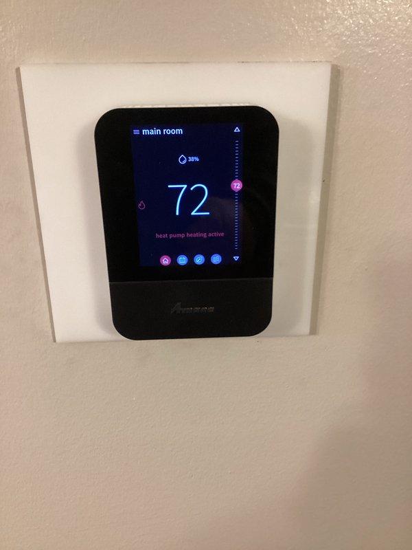 Performed scheduled maintenance service on heat pump system as part of customer's renewal plan. Inspected Amana outdoor unit, verified proper operation with heat pump heating function active. Confirmed smart thermostat displaying correct readings at 72°F with 38% humidity and proper system response. System functioning normally with no issues identified.
