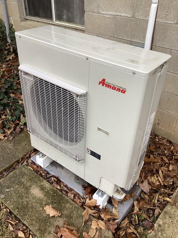 Performed scheduled maintenance service on heat pump system as part of customer's renewal plan. Inspected Amana outdoor unit, verified proper operation with heat pump heating function active. Confirmed smart thermostat displaying correct readings at 72°F with 38% humidity and proper system response. System functioning normally with no issues identified.