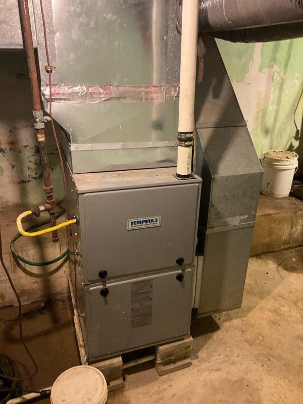 Performed diagnostic on Tempstar furnace after customer reported suspected gas leak and overheating concerns. Inspection revealed leaking gas valve and pressure regulator, as well as severely cracked and rusted heat exchanger. Recommended complete system replacement due to safety hazards and equipment condition.
