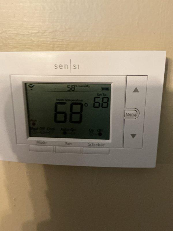 Completed scheduled heating maintenance service on customer's Lennox heat pump system. Inspected outdoor unit, verified proper operation of thermostat (Sensi Wi-Fi model showing proper connectivity and temperature control at 68°F), and performed standard heating tune-up procedures. System is functioning normally with no issues identified.