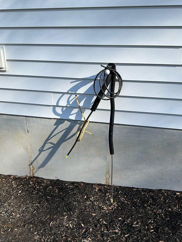 Inspected incomplete mini-split installation initiated by previous homeowners at new client's residence. Observed partial exterior installation with electrical components and line sets penetrating through exterior siding, showing evidence of improper weatherproofing. Evaluated current setup to provide estimate for proper completion of the mini-split system installation.