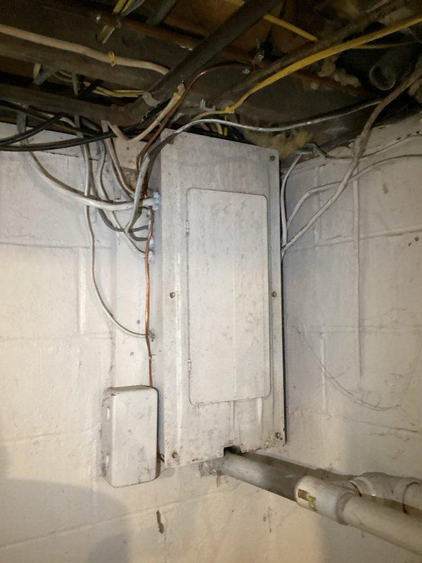 Conducted scheduled prepaid maintenance visit during morning appointment window. Inspected toilet tank and found mineral deposits with water level running lower than optimal; cleaned components and adjusted float assembly to proper height. Examined electrical panel and plumbing infrastructure in basement, confirming all connections were secure with no visible leaks or electrical hazards.