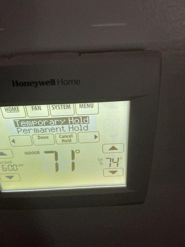 Performed routine furnace maintenance for membership holder Nancy Reynolds. Inspected interior components of heating system including electrical connections, wiring harnesses, and PVC ventilation/drainage pipes. Checked Honeywell Home digital thermostat functionality; confirmed proper operation with temperature settings at 71°F actual/74°F target.
