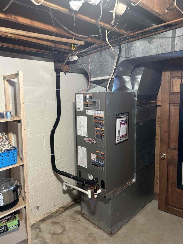 Installed new Lennox heat pump system with compatible indoor furnace unit in basement. Properly connected all ductwork with sealed joints and ensured proper sizing of return air filtration (20"x20"x1"). System installation is complete and operational.