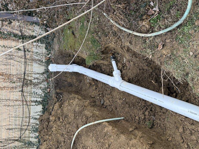 Excavated trench and replaced main drain line with new PVC piping, successfully installing a cleanout access point as requested. Additionally, installed customer-provided toilet that was not on the original invoice. RC performed excavation work to access the drain line.