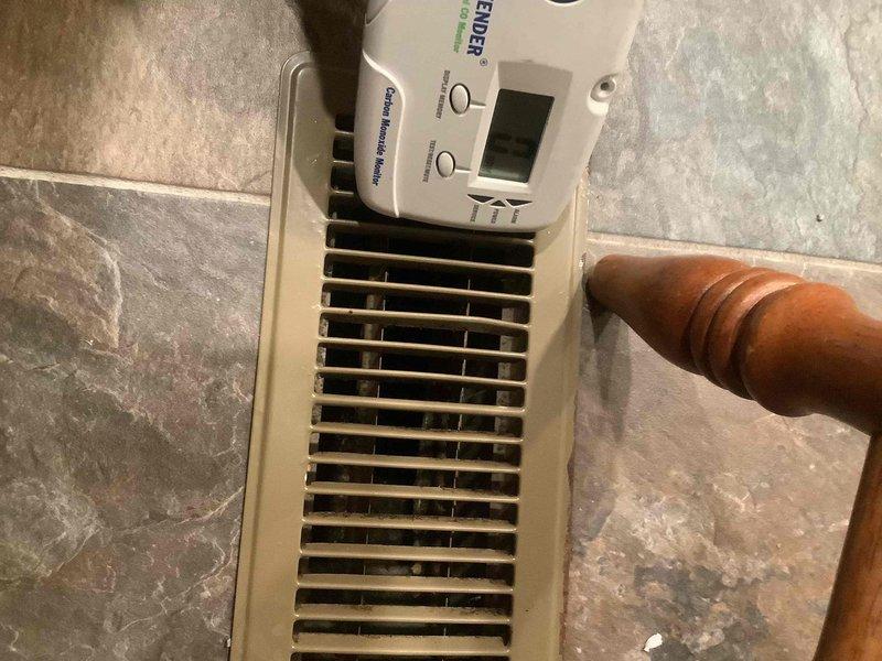 Returned to customer site with manufacturer ignitor as planned. Performed temperature verification tests to confirm proper heating operation, with output temperature registering at 103.9°F from supply registers. Carbon monoxide safety check was also conducted at floor vents to ensure safe operation of the newly repaired system.