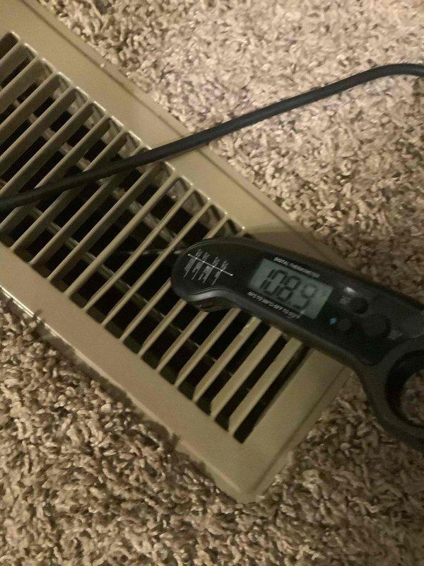 Returned to customer site with manufacturer ignitor as planned. Performed temperature verification tests to confirm proper heating operation, with output temperature registering at 103.9°F from supply registers. Carbon monoxide safety check was also conducted at floor vents to ensure safe operation of the newly repaired system.