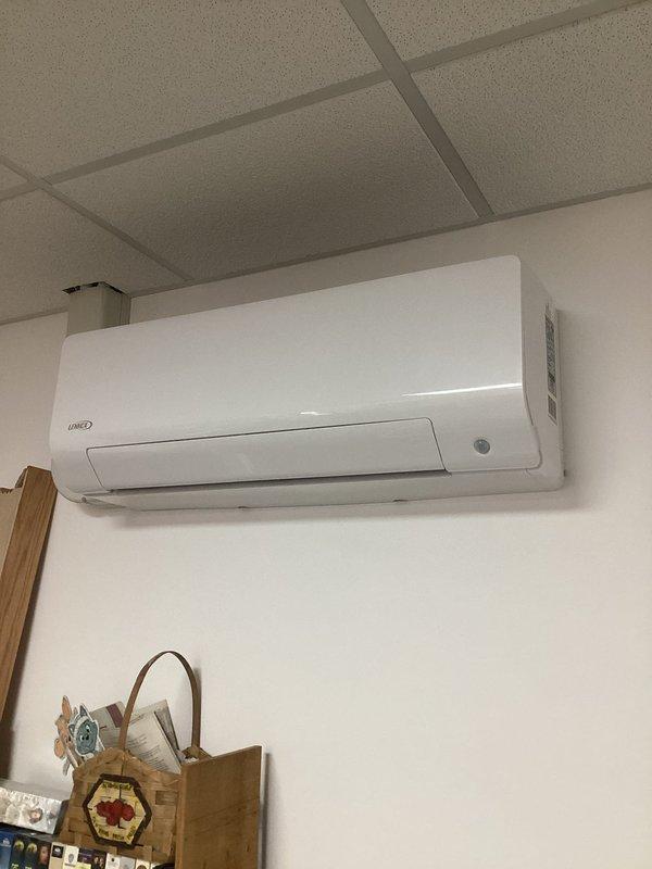 Completed bimonthly maintenance service on a two-system, three-head mini-split HVAC configuration. Inspected and serviced all indoor units including the wall-mounted heads in both wood-paneled and drop-ceiling areas. Air filters were cleaned, condensate drainage checked, and all components verified for proper heating operation.