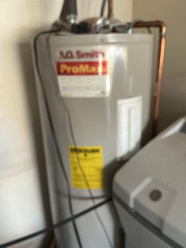 Performed scheduled basic monthly maintenance on the CCHP-Heating system. Inspected A.O. Smith ProMax water heater for proper operation and verified Honeywell Home ProSeries thermostat functionality, confirming heat mode operation with current temperature at 74°F against setpoint of 70°F. Filter replacement not included in this service.