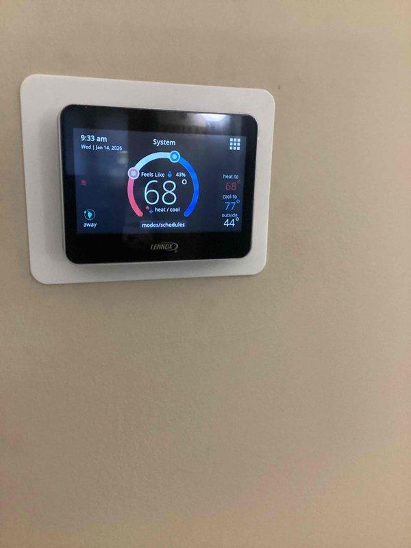 Performed scheduled winter maintenance on Lennox heating system. Inspected furnace, air handler, and associated ductwork; verified thermostat functionality with proper heat/cool settings (68°/77°) and confirmed outdoor temperature sensor accuracy (44°F). All components operating within normal parameters with no issues detected.