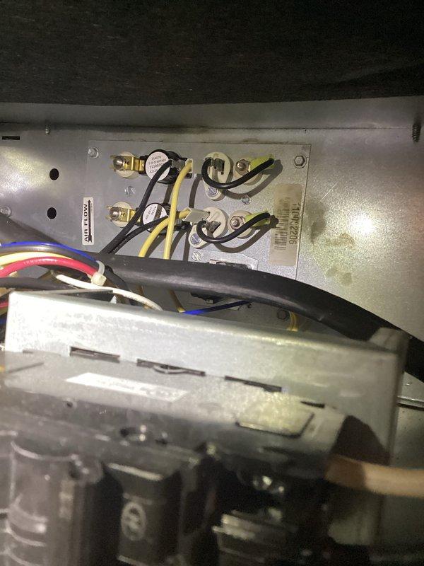 Performed scheduled furnace maintenance on residential heating system. Inspected electrical connections at terminal block and examined ductwork for proper installation. All components appear to be in working order with properly secured wiring connections.