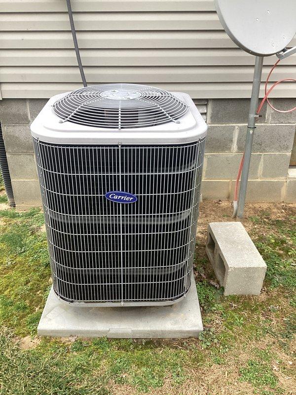 Performed comprehensive tune-up service on Carrier HVAC system. Inspected outdoor condensing unit and interior components for proper operation. Confirmed customer had recently replaced air filter, which was properly installed and functioning correctly.