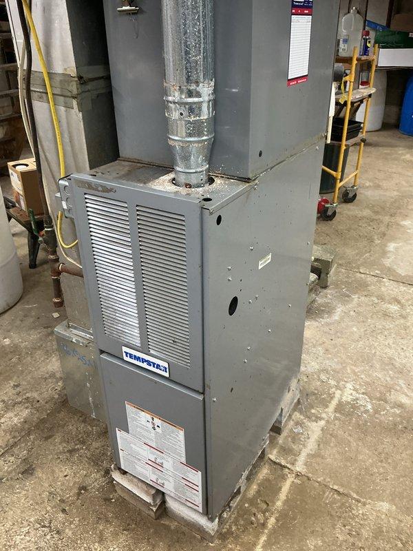 Performed scheduled CCH maintenance service on Tempstar heating system. Inspected furnace components, verified proper operation, and replaced 16x25x1 filter as part of regular maintenance. Documented equipment condition with photos of furnace unit and adjacent water heater for customer records.