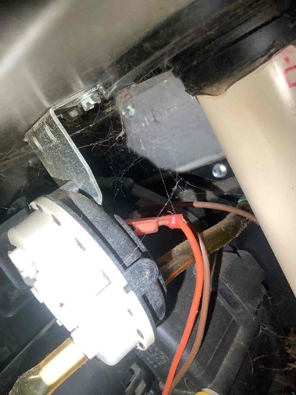 Completed replacement of failed inducer motor on customer's HVAC system. Visual inspection revealed dust accumulation and cobwebs on the existing unit. Installation included proper wire connections to the new motor assembly, with customer having paid the required deposit for the repair.