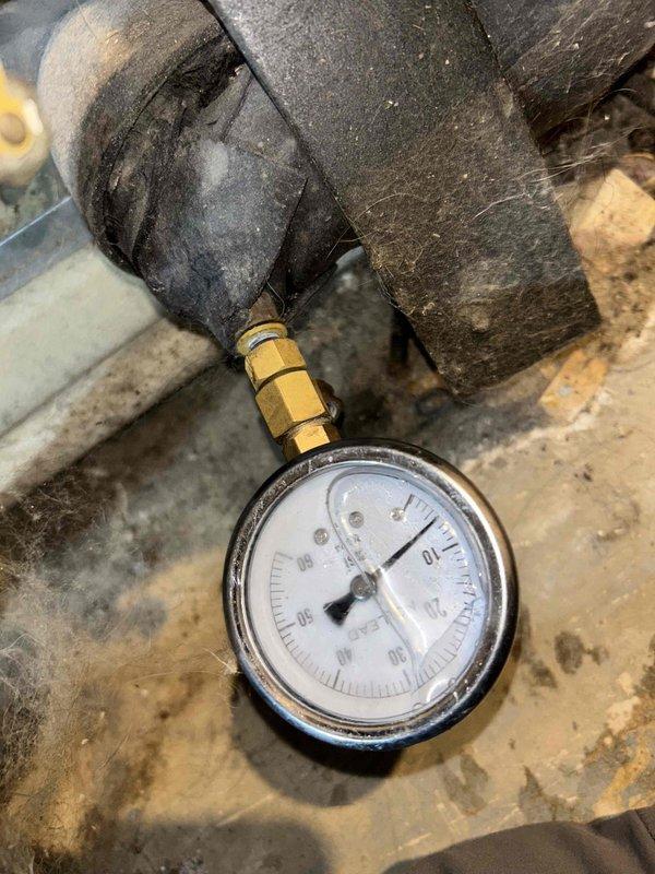 Responded to service call for non-operational geothermal system. Inspection revealed low pressure reading of approximately 10-15 PSI on system gauge, indicating potential refrigerant issue. Visual examination of internal wiring showed normal connections with no apparent damage to electrical components.