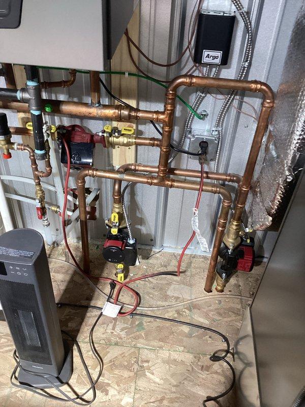 Performed warranty service on heating system with uneven heat distribution across floor. Inspected PEX manifold system and copper pipe network. Identified and corrected issues with circulation through manifold valves, ensuring proper flow balance to resolve the partial heating problem.