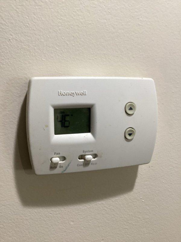 Responded to service call for non-operational York HVAC unit. Performed diagnostic inspection of the system components and connections in utility closet. Verified thermostat functionality, which displayed proper temperature reading (76°F) and had operational controls for fan and system settings.