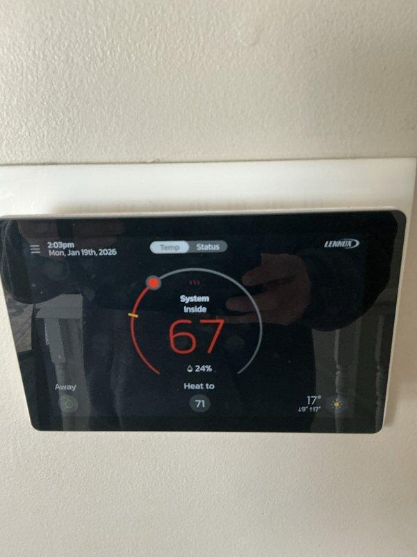 Performed scheduled maintenance on Lennox heating system under CCHBasic Renewal plan. Inspected system components including insulated pipes and ductwork, noting condensation on black foam insulation. Verified proper thermostat operation with system maintaining 67° indoor temperature against 17° outdoor temperature, set to heat to 71°.