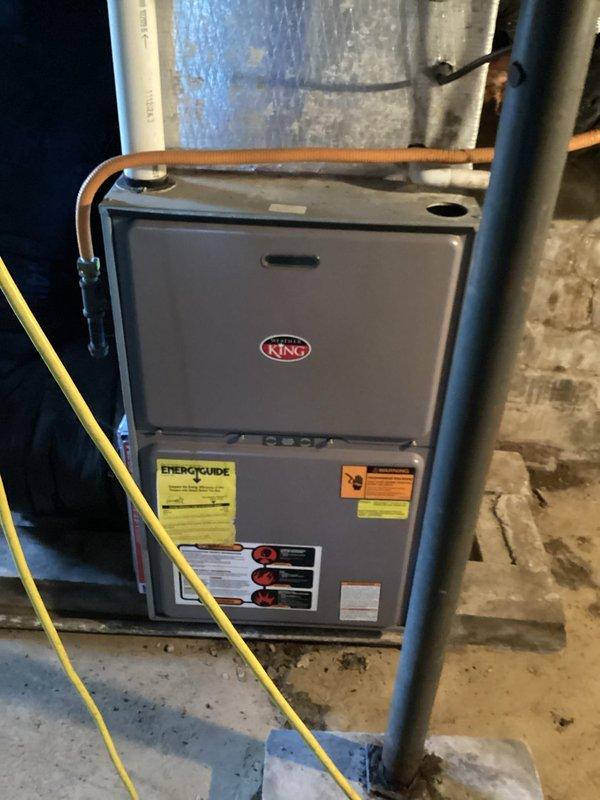 Responded to no-heat call for KING furnace not operating. Diagnosed failed inducer motor preventing proper combustion. Replaced inducer motor assembly, verified proper ignition sequence, and confirmed system operation. Thermostat now maintaining desired temperature from previous 56°F indoor reading.