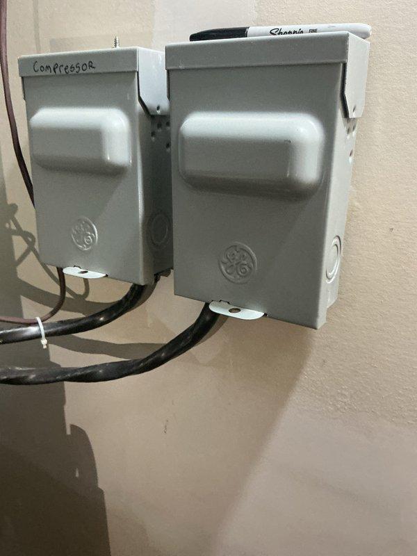 Performed scheduled maintenance on customer's geothermal heating system. Inspected electrical components including compressor disconnect box and relay/transformer assembly. Verified all connections were secure with proper wire terminations and confirmed system operation.