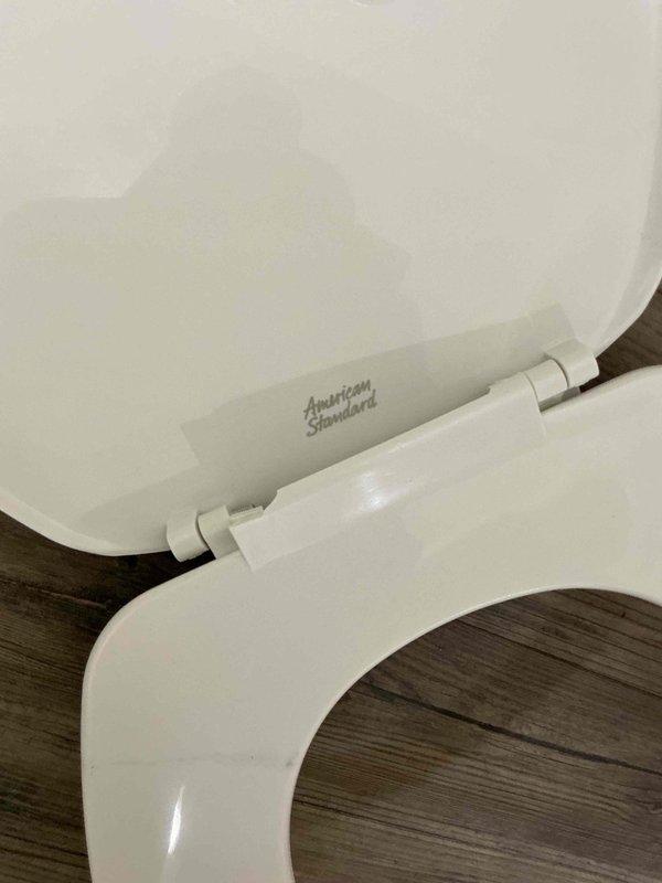 Responded to service call for toilet flushing issue. Inspected American Standard toilet and flush mechanism. Identified malfunctioning components in tank including float assembly. Serviced flush valve system and restored proper toilet function.