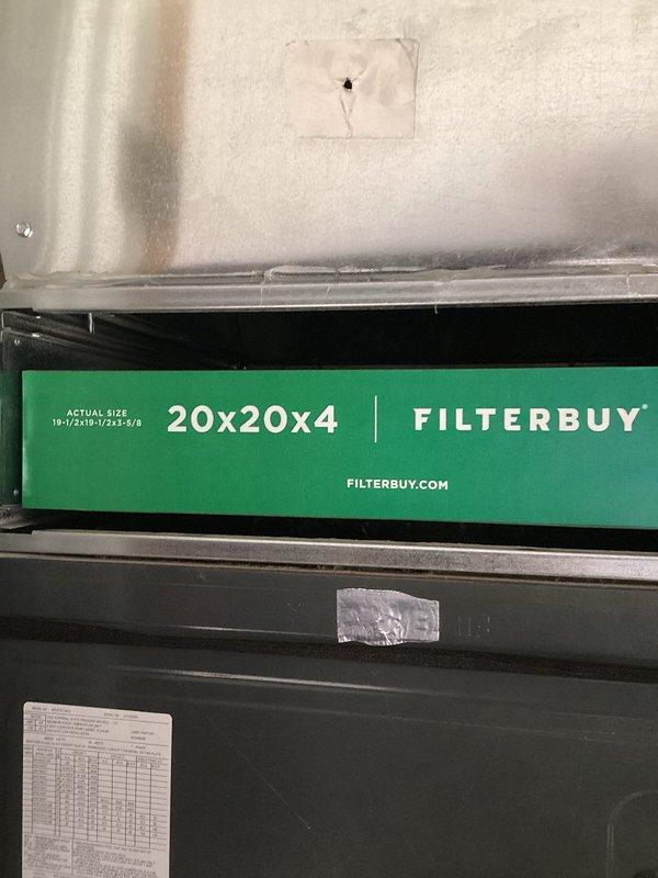Responded to call for furnace running constantly on emergency heat mode. Inspected system and found low battery (25%) on ecobee thermostat potentially contributing to control issues. Installed new 20x20x4 FilterBuy air filter to ensure proper airflow and system efficiency. System now operating normally with proper heating cycle engagement.