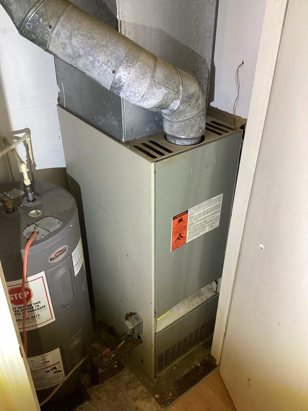 Responded to no-heat call for a Ruud furnace system over 10 years old. Diagnosed failed ignition sequence preventing heat production. Found thermostat reading 48°F despite being set to heat mode. Cleaned flame sensor, replaced worn ignitor assembly, and verified proper gas valve operation. System now cycling normally with consistent flame and appropriate temperature rise across heat exchanger.