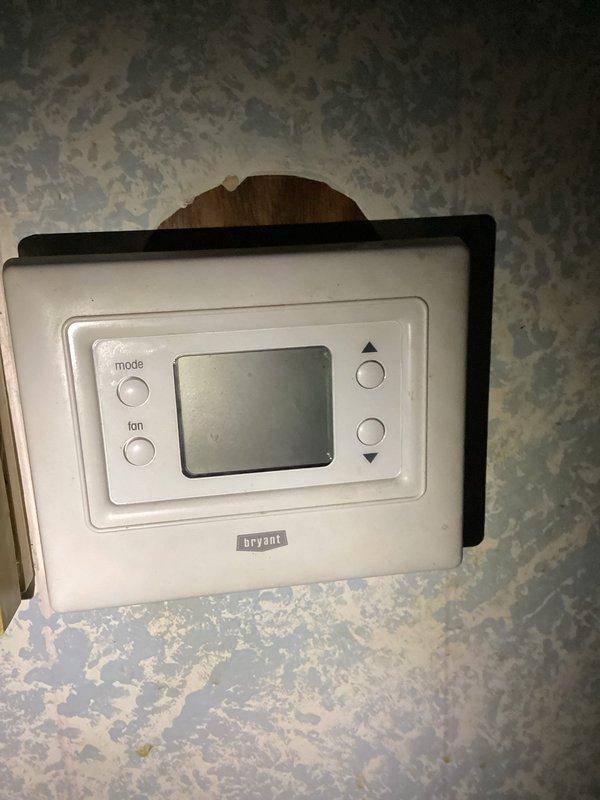 Responded to no heat complaint where home temperature was 62°F despite thermostat setting of 74°F. Diagnosed issue with Bryant thermostat communication to Rheem furnace system. Repaired connection fault in control wiring between thermostat and furnace, restored proper system operation, and verified heating function before departure.