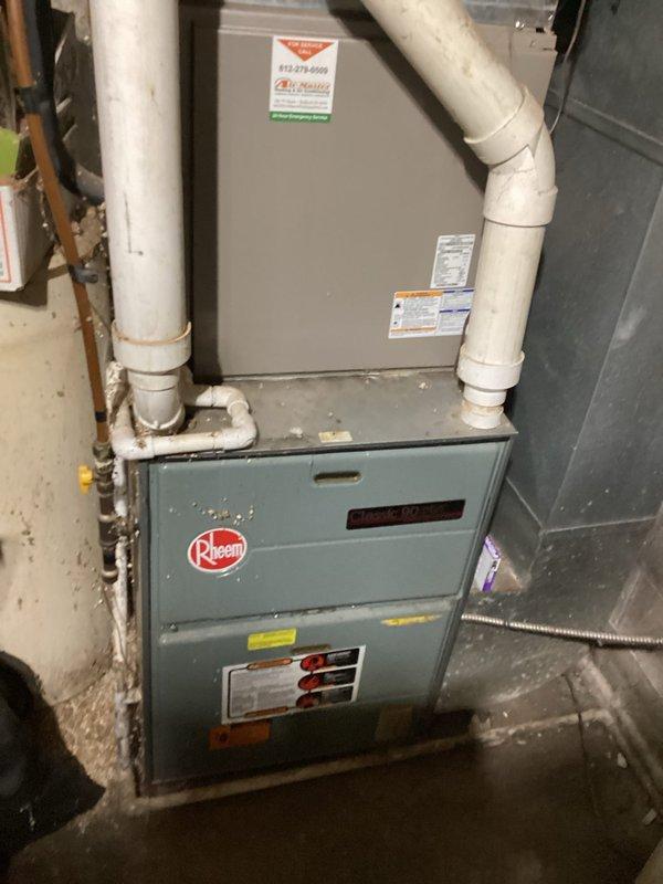 Responded to no heat complaint where home temperature was 62°F despite thermostat setting of 74°F. Diagnosed issue with Bryant thermostat communication to Rheem furnace system. Repaired connection fault in control wiring between thermostat and furnace, restored proper system operation, and verified heating function before departure.
