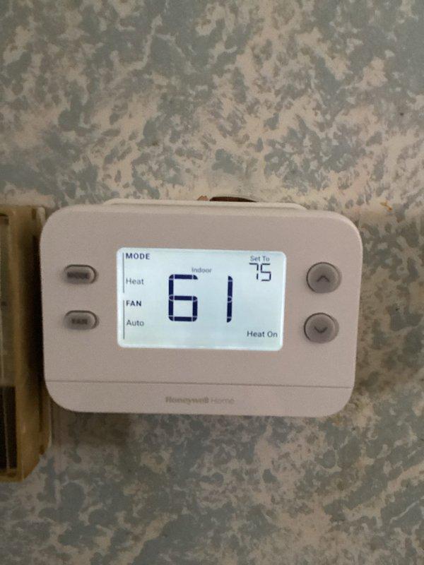 Responded to a heating system issue where customer reported thermostat reading 61°F despite being set to 75°F. Diagnosed short-cycling furnace that was operating for approximately 5 minutes before shutting down. Identified water pooling around unit causing potential safety concerns and system inefficiency. Remediated moisture issue and restored proper heating operation.