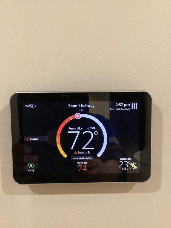 Responded to customer call regarding insufficient heating. Diagnosed error code 270 in both basement and upper furnace units. System was blowing minimal hot air. Performed system reset and verified proper operation using digital thermometer, confirming accurate temperature readings between thermostat display and actual room temperature.