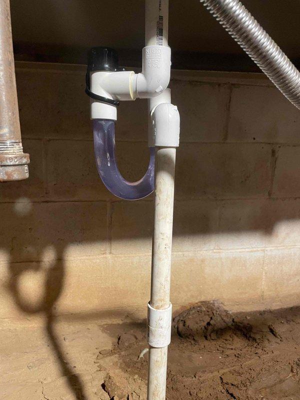 Diagnosed HVAC system requiring replacement of gas valve and drain trap. Inspected and photographed existing P-trap assembly with transparent section and measured gas pressure readings of 9.63/9.62 inWC. Will return with necessary replacement components to complete repair.