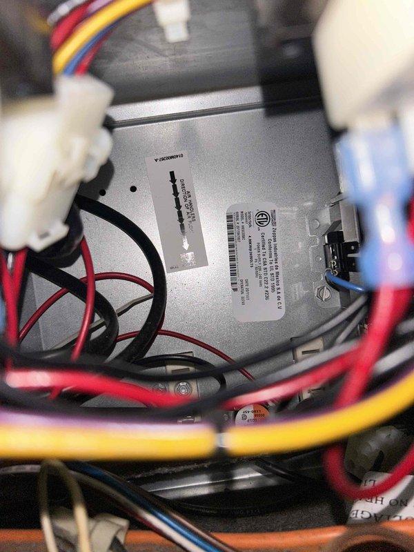 Responded to warranty call for recently installed system where thermostat was blank and furnace was producing cold air. Customer reported previous service call for gurgling noise. Inspected internal control board connections and insulated line set, ensuring all wiring was properly secured and functioning. System now operating correctly.