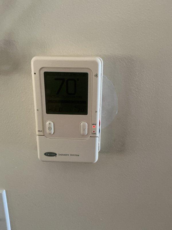Performed annual heating maintenance on Carrier Infinity System. Conducted combustion analysis showing proper operation with O2 at 8.5%, CO at 41ppm, CO2 at 7.1%, and flue temperature at 97.1°F. System is operating efficiently with heat cycle functioning normally as verified on thermostat.