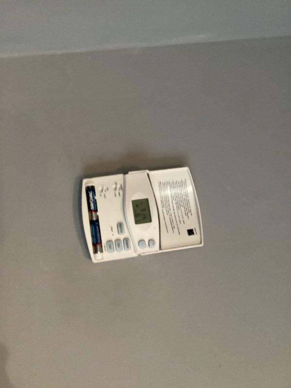 Responded to no heat call after customer returned from trip to find home at 50°F with frozen condenser line. Performed diagnostic testing with digital measurement tool, confirming system is now producing proper airflow at 70°F. Verified thermostat operation and restored heating functionality to normal parameters.