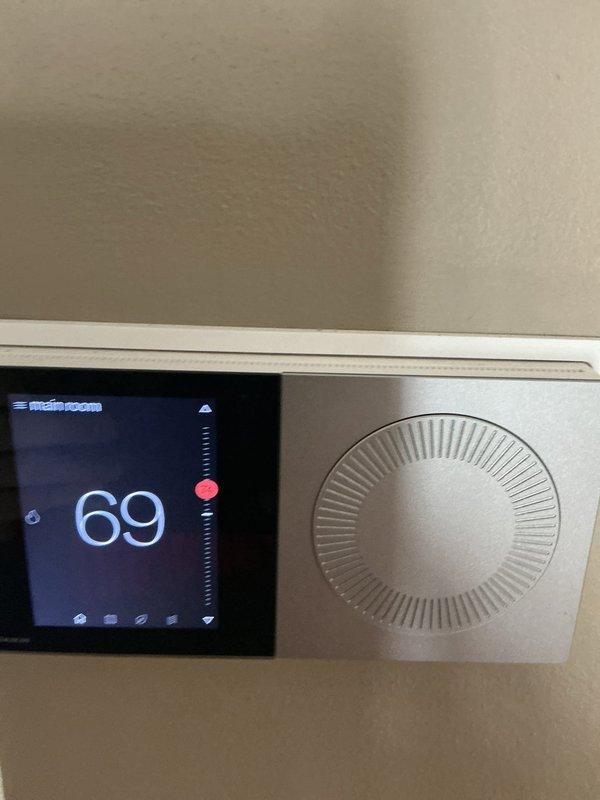 Completed rescheduled monthly basic CCHP-Heating maintenance service. Inspected system operation and verified thermostat functionality, with current temperature reading at 69°F. Noted that 20x20x4 filter replacement was not included in this service visit as specified in the work order.