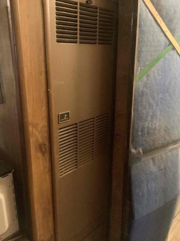 Inspected furnace unit with focus on gas valve system. Identified Unitrol gas valve with reset button and examined associated wiring connections. Evaluated overall condition of furnace including ventilation grills and surrounding insulation. No repairs were needed at this time.