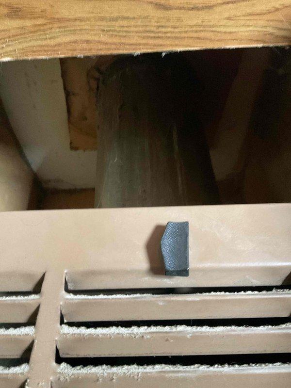 Performed on-site assessment of customer's 30+ year old heating system with failed gas valve. Unit is a wall-mounted furnace installed in a compact living space with wooden paneling. Inspection revealed significant age deterioration and ventilation issues. Recommended complete system replacement due to obsolete components and inefficiency. Customer indicated urgency for installation with preference for immediate scheduling.