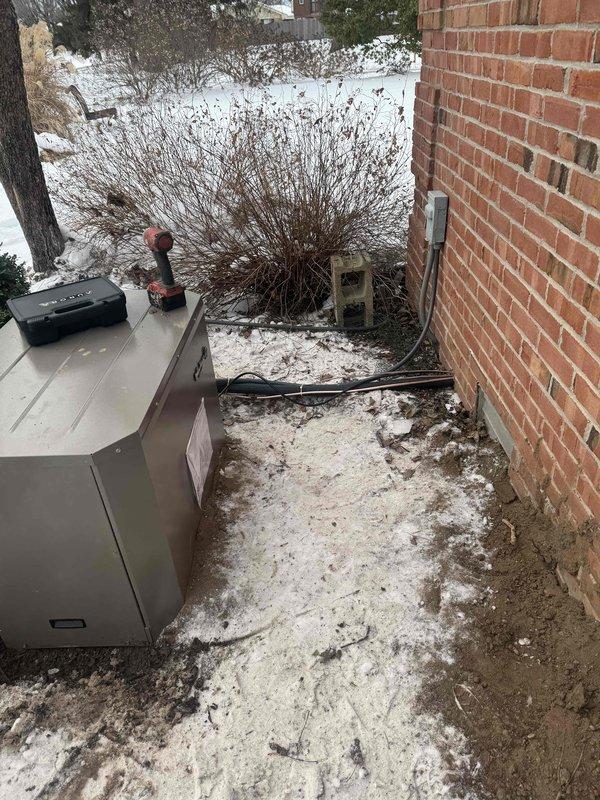 Successfully completed installation of a Water Furnace Geothermal Split System. System components were properly positioned with outdoor unit mounted against the structure and ground loop unit installed in the yard. All electrical connections and system controls were verified operational upon completion.