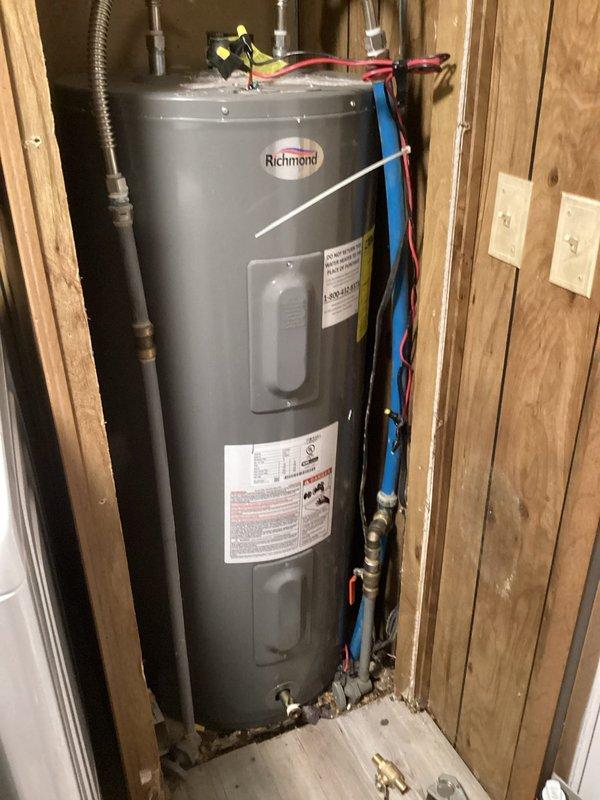 Installed pressure reducing valve (PRV), thermal expansion tank, and new shutoff valve on Richmond tanked water heater. Replaced defective temperature and pressure relief valve (T&P) to restore proper safety functionality. All connections tested for leaks and system verified operational.
