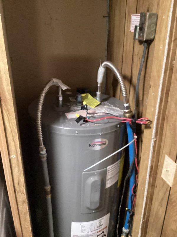 Installed pressure reducing valve (PRV), thermal expansion tank, and new shutoff valve on Richmond tanked water heater. Replaced defective temperature and pressure relief valve (T&P) to restore proper safety functionality. All connections tested for leaks and system verified operational.