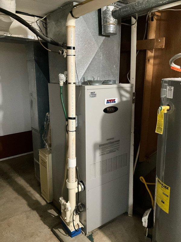 Conducted comprehensive evaluation of existing HVAC system for Adam Ruch, focusing specifically on furnace replacement options. Inspected current Heil furnace unit in basement utility area, documenting system age and condition as well as examining electrical service panel to assess capacity for potential replacement. Customer seeking immediate heating system upgrade with furnace-only replacement solutions.