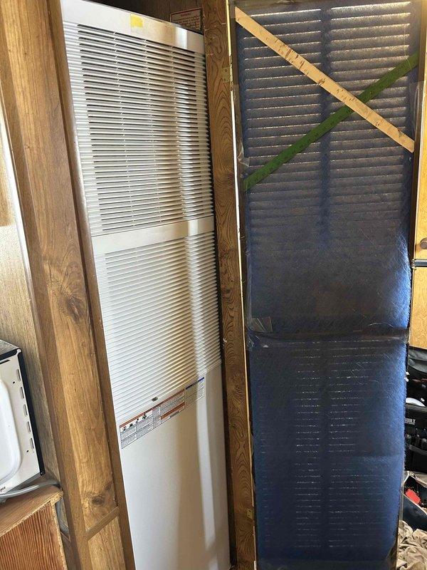 Performed mobile home furnace replacement, installing new indoor unit only. Removed heavily soiled air filter with significant dust buildup and replaced with clean filter. Took all three roof jack sizes for proper installation compatibility.