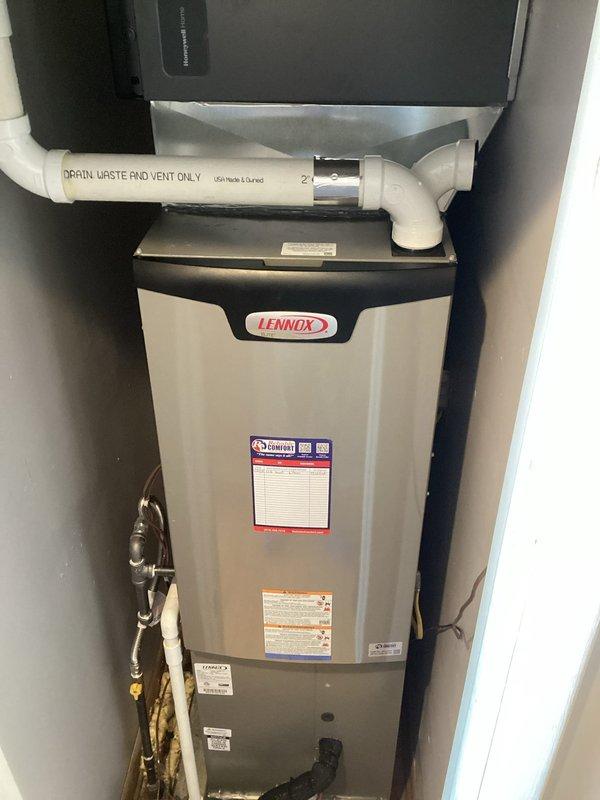 Responded to callback for system displaying multiple error codes (E240, H1, A875, H24O). Inspected Lennox HVAC unit and identified water damage on adjacent flooring. System was reset and diagnostics performed to address recurring fault codes. Customer waived trip fee.