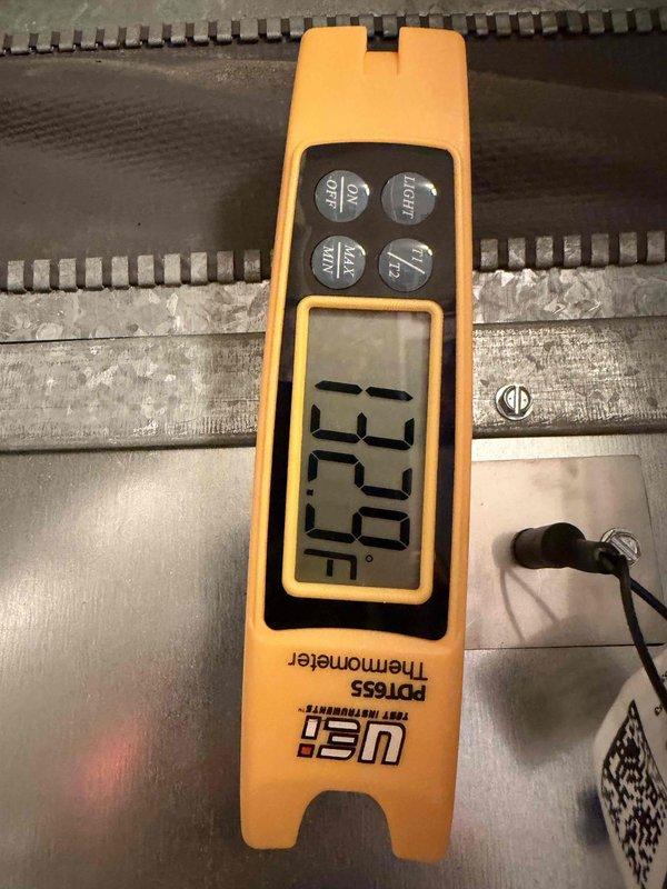 Completed installation of a complete HVAC system at customer's residence, including mounting and configuring a new digital thermostat control interface. System verification tests performed with PDT655 digital thermometer confirmed proper temperature regulation at 75.0°F, ensuring optimal system performance.