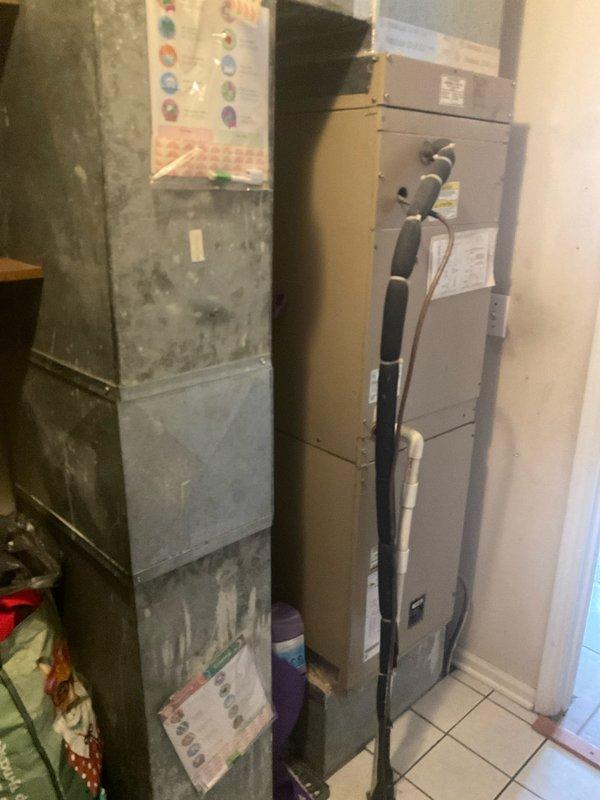 Conducted initial assessment of property featuring dual HVAC system setup with one older electric unit showing significant wear and a newer secondary unit. Client expressed interest in comprehensive system upgrade including humidity control capabilities, dual-zone configuration (upstairs/downstairs), and air purification features. Documented existing return air registers and current thermostat placement for zoning evaluation. Client requesting both cash and financing options for comparison.